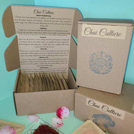 Chai Culture spice packaging with open box on a teal background